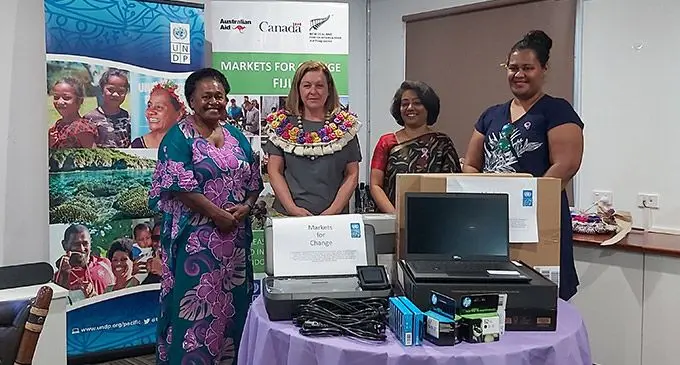Assistant Minister for Women, Children and Poverty Alleviation Sashi Kiran (second from right) and UNDP Pacific Office in Fiji Resident Representative Dawn Del Rio (second from left) during the handing over at the UNDP Pacific office in Suva during the celebration of International Women’s Day on March 2, 2023. Photo: Ashna Kumar