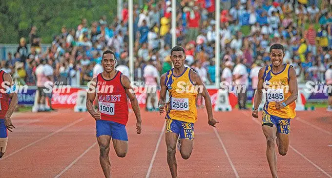 Marist Brothers High School’s Mesulame Tuigau and Suva Grammar School’s Semesa Caginivalu during the Coca-Cola Game senior boys 100metres final at the HFC Bank Stadium in Suva on April 28, 2023. Photo: Leon Lord