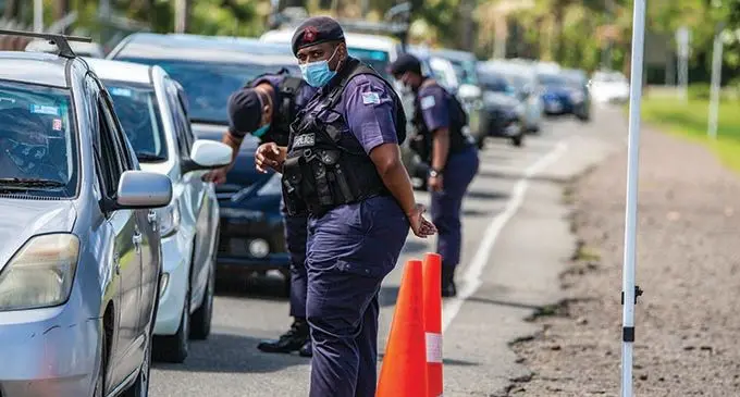 Police officers checking vehicles along the Queen Elizabeth drive in Nasese on September 7 2021.  Photo: Leon Lord 
