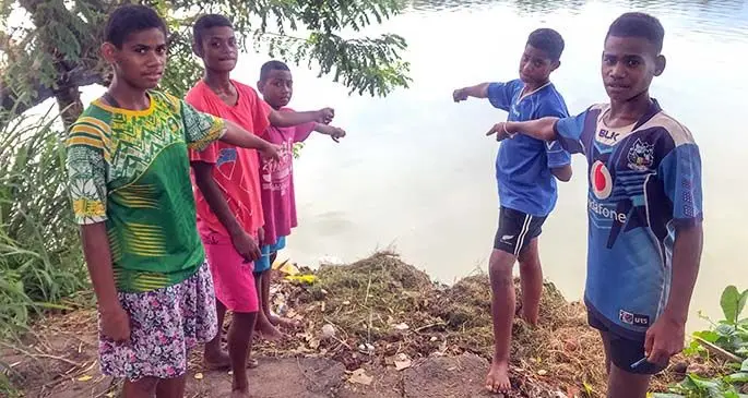 (From left: Kali Jane, Taina Nino, Uraia Lagilagi, Sakenasa Rakaria and Ben Colodonu at the swimming spot where Pauliasi Ratunawaqe drowned. Photo: Kelera Sovasiga