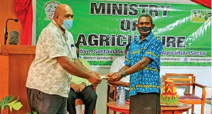 Commissioner Northern Uraia Rainima hands over an offer letter to recipient, Atunaisa   Tunayau in Labasa Town on November 23, 2021. Photo: Sampras Anand