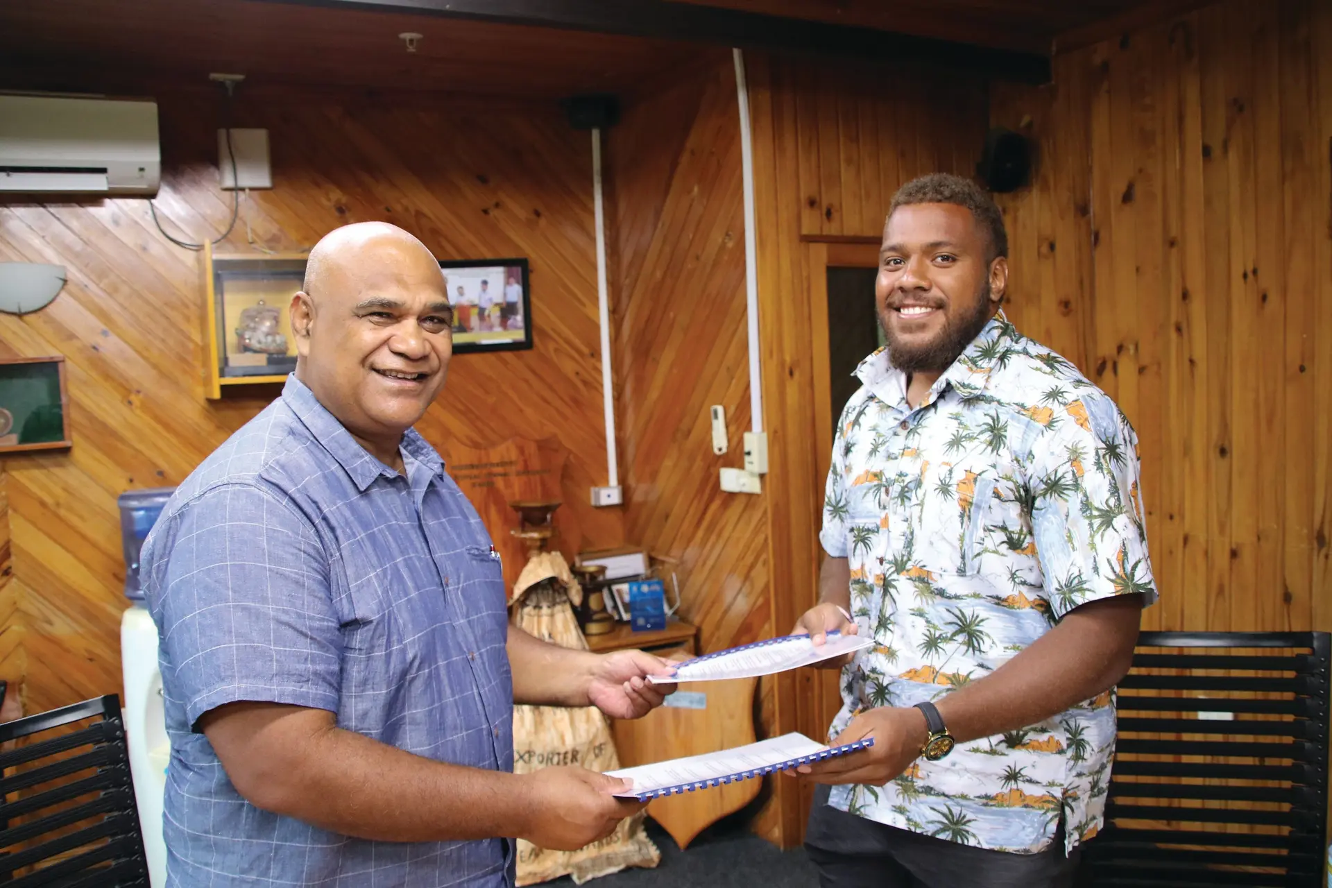 Fiji Pine Group of Companies Executive Chairman Ratu Rakuita Vakalalabure signs deal with Tevita Ikanivere on January 19, 2024.