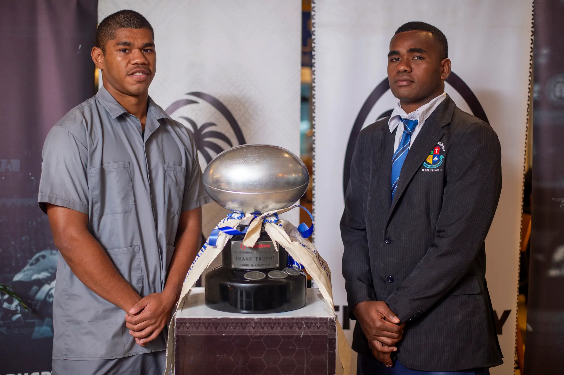From left: Suva Grammar School Under-18 captain Waisele Bolakoro and Lelean Memorial School U18 captain Luke Daunitutu with the Vodafone Super Deans Trophy photo shoot at Tanoa Plaza in Suva on August 21, 2026. Photo: Leon Lord