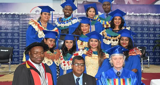 Minister for Agriculture, Waterways and Environment Mahendra Reddy with the Bachelor of Veterinary Science and Animal Husbandry graduates and FNU staff members at the FMF Gymnasium in Suva on March 11, 2020.  Photo: Ministry of Agriculture, Waterways and Environment
