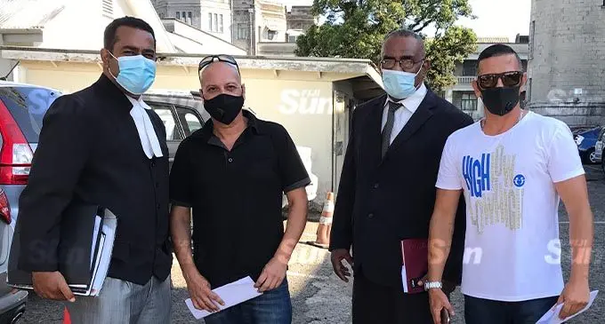 Loizos Petridis and Cleanthis Petridis with their lawyers Filimoni Vosarogo and Joji Cakau outside the Magistrates Court in Suva on October 28, 2021. Photo: Ashna Kumar 