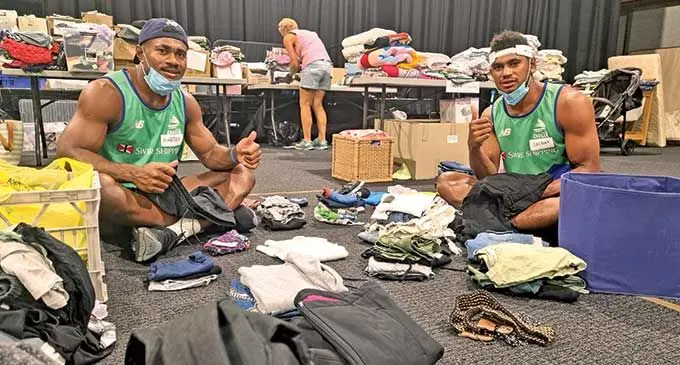 Swire Shipping Fijian Drua reps Vinaya Habosi and Kitione Salawa at one of the evacuation centres at Lennox Head, NSW, Australia, on March 9, 2022.   Photo: Fijian Drua