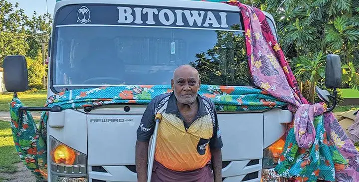 78-year-old Mataqali head, Timoci Tuiwai, standing infront of the new carrier. Photo: Mereleki Nai
