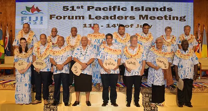 (First row from left): New Zealand Prime Minister Jacinda Ardern, Niue Foreign Minister Dalton Tagelagi, Federated States of Micronesia President David Panuelo, Pacific Islands Forum Leaders chair and Fijian Prime Minister Voreqe Bainimarama, Palau’s President Surangel Whipps Jr, French Polynesia’s Vice President Jean-Christophe Bouissou, Samoa’s Prime Minister Fiame Naomi Mata’afa and Solomon Islands Prime Minister Manasseh Sogavare. (Back row from left): Tonga’s Prime Minister Siaosi Sovaleni, Vanuatu’s Prime Minister Bob Loughman, New Caledonia’s President Louis Mapou, Cook Islands Ministry of Foreign Affairs & Immigration Secretary Tepaeru Herrmann, Nauru’s Deputy Minister of Foreign Affairs Asterio Appi, Tuvalu’s Foreign Affairs Minister Simon Kofe, Australia’s Foreign Affairs Minister Senator Penny Wong and Pacific Islands Forum Secretary-General Henry Puna during the traditional welcoming ceremony at the Grand Pacific Hotel on July 12, 2022. Photo: Ronald Kumar