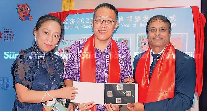 From left: China Cultural Centre director Han Xiaoyan, Embassy of the People’s Republic of China in Fiji counselor Wang Xuguang and Post Fiji chief executive officer Anirudha Bansod at China Cultural Centre in Ganilau House, Suva, on February 15, 2022. Photo: Ronald Kumar