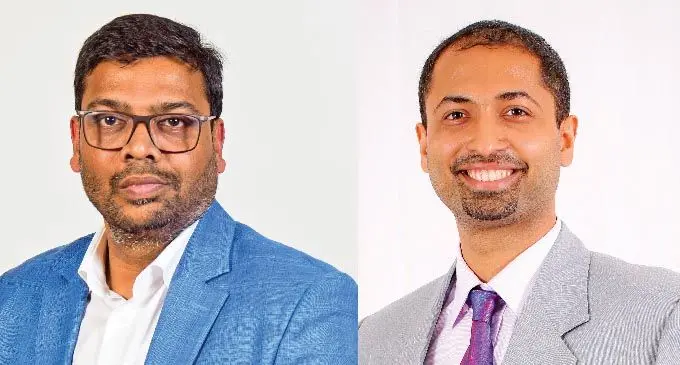 L-R: Satyen Singh new general manager for Datec Fiji PTE Limited and Outgoing Datec general manager Ateen Kumar 