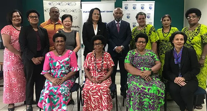 Standing third from left: Reserve Bank of Fiji Deputy Governor, Esala Masitabua, South Pacific Business Development director Lorraine Seeto, Minister for Women, Children, and Poverty Alleviation Rosy Akbar and Fiji Development Bank chief executive officer Saud Minam with representatives from women’s centres and officials on April 21, 2022. Photo: Laisa Lui