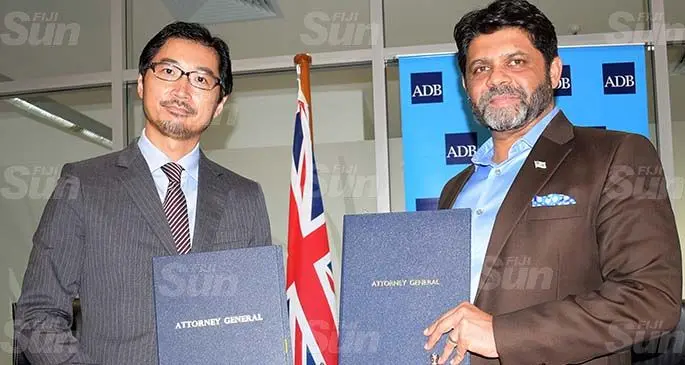 Asian Development Bank Regional Director of the Pacific Sub-regional Office Masayuki Tachiiri (left), with Attorney-General and Minister for Economy Aiyaz Sayed-Khaiyum after signing the agreement at Ro Lalabalavu House in Suva on May 7, 2020. Photo: Ronald Kumar