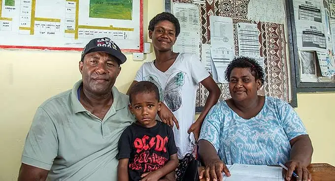 Isei Matakarawa with his family Pita Lenira, Merewairiki Vakamalua (mother) and Naomi Matakarawa after picking their education assistance forms at Nabua Secondary School on January 11, 2023. Photo: Leon Lord