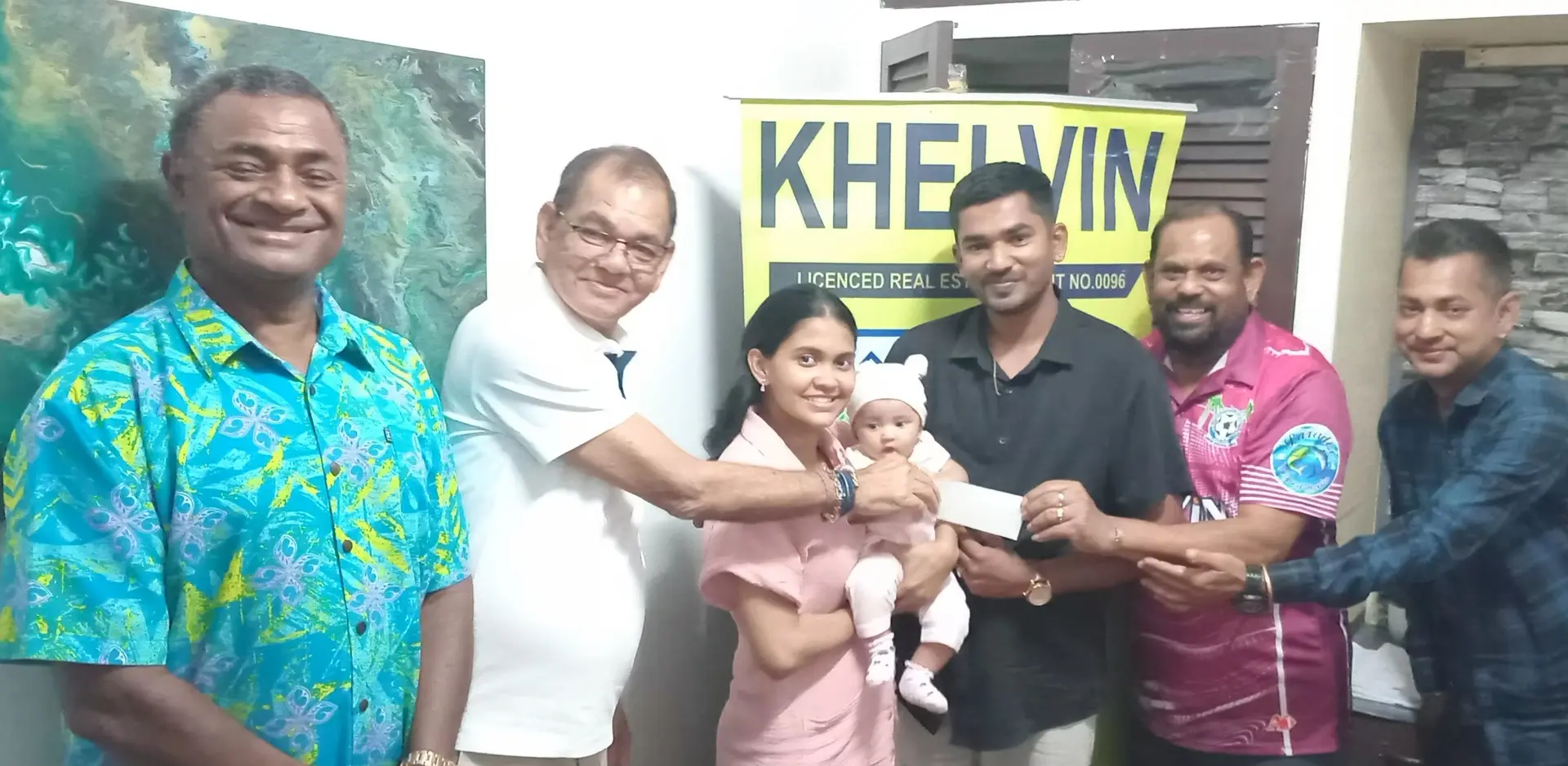  Wame Naivalu, Khelvin Realtors operations manager, Vyas Deo Sharma, CEO Neeha Sharma, Vinha Sharma (baby), Khelvin Sharma, director, Shalendra Prasad, president Lautoka FA and Vipul Sharma, director on August 27, 2026. 