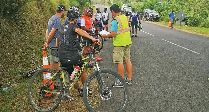 Cycling Fiji Championship 2022 at Sigatoka valley. Inset right: Qaqi Mai Bike Share Fiji founder, Eliki Dakuitoga. Photos: Théo Dumanchin (Facebook)