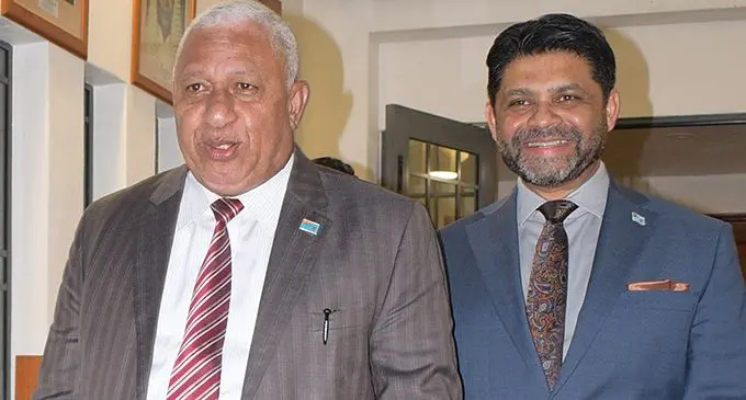Prime Minister Voreqe Bainimarama and Attorney-General and Minister for Economy Aiyaz Sayed-Khaiyum outside Parliament last night after the Budget address. Photo: Ronald Kumar