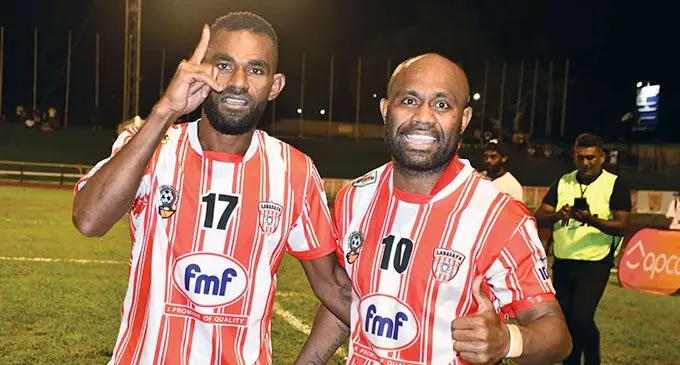 Extra Supermarket Labasa players Lekima Gonerau (left) and Christopher Wasasala after the final of the FMF Inter-District Championship against Navua at Churchill Park, Lautoka on October 20, 2024. Labasa won 5-3 via penalty shootout. Photo: Waisea Nasokia