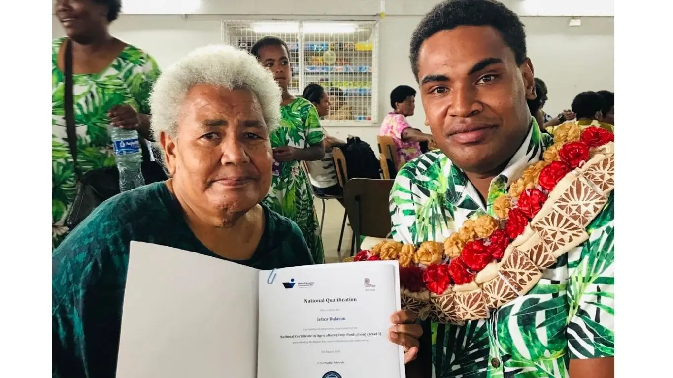 Sera Vuli (left) and graduate Jefica Bulavou at the Pacific Polytech Cohort 6 National Qualification Graduation Ceremony held at Vunimono Hall, Nausori, on August 5, 2026.