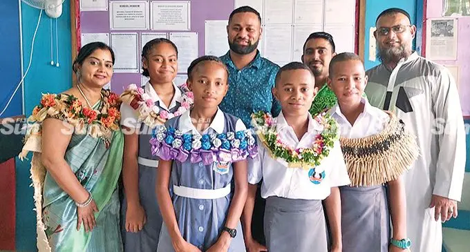 From left: Fiji National University lecturer Rohini Chand, head girl Adi Kuila Kalolaini, deputy head girl Cherry Taga, Teacher Manueli Nakete, Deputy head boy Lenaitasi Tawase, Teacher Ameshwa Lal, head boy Jokimi Naevo, and head teacher Roshill Ali. Photo: Waisea Nasokia