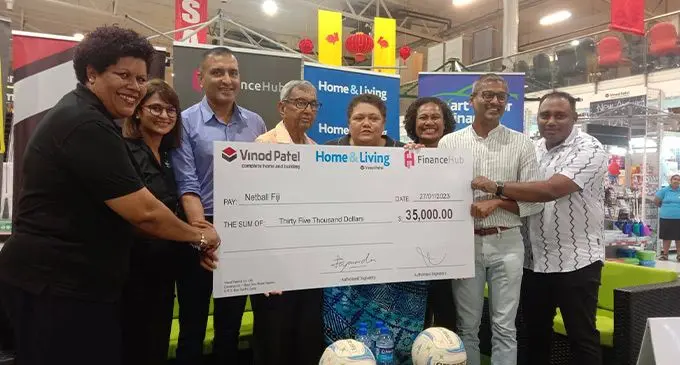 Vinod Patel chief executive officer Rahul Amin (third from left), founder Vinod Patel (fourth), Netball Fiji chief executive officer Vivian Koster (fifth) and staff members during the partnership signing at Vinod Patel, Laucala Beach on January 27, 2023. Photo: Sereana Salalo