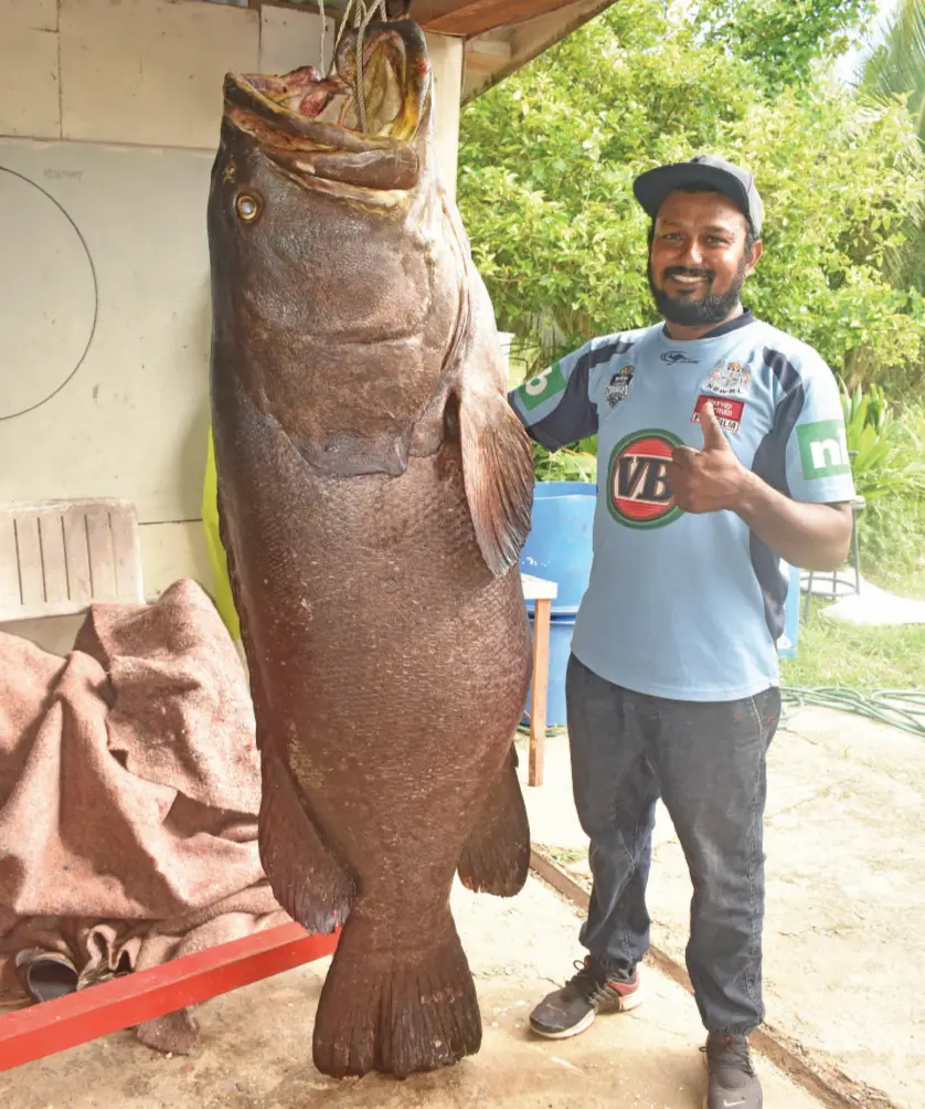 Nadi fisherman, Dineshwar Reddy beside the Kawakawa that he caught on February 21, 2019, at the back of Sonaisali Island in Nadi. Photo: Nicolette Chambers