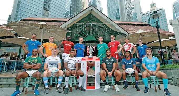 Fiji Airways Fiji sevens captain Tevita Daugunu (sitting, third from left) during the captain’s photo shoot at Lau Pa Sat in Singapore on April 5, 2023. Photo: World Rugby Sevens.