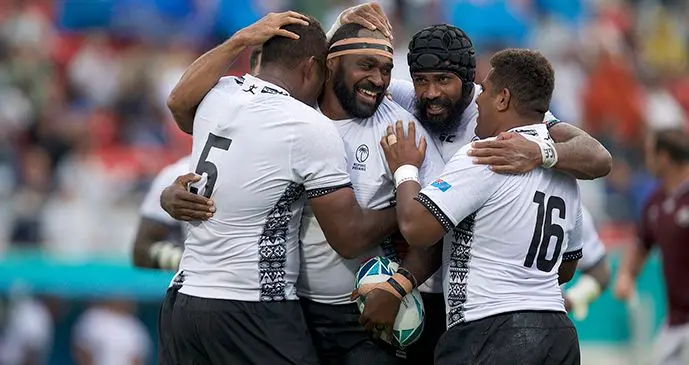 Fiji Airways Flying Fijians (from left) Leone Nakarawa Api Ratuniyarawa, Dominiko Waqaniburotu and Veremalua Vugakoto celebrate Ratuniyarawa’s try against Georgia.  Fiji won 45-10.  Photo: Bruce Southwick/ZoomFiji