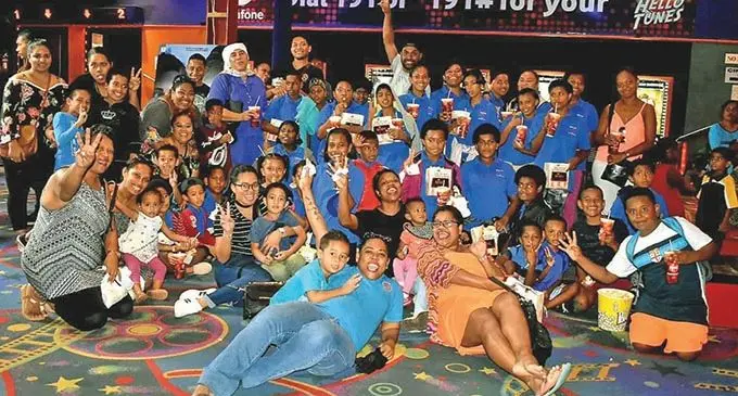 New Zealand company Harmoney staff members with the children of Saint Christopher’s Home at a movie treat  on Saturday March 2, 2019 