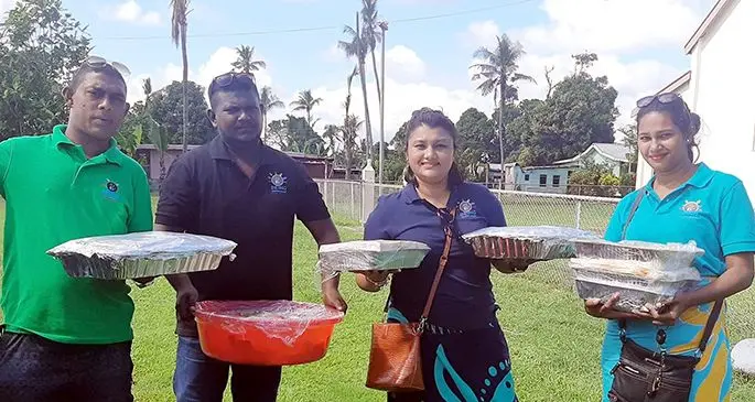 A team from the Being Helping Hands Fiji with food packs in Ba ready to be distributed.