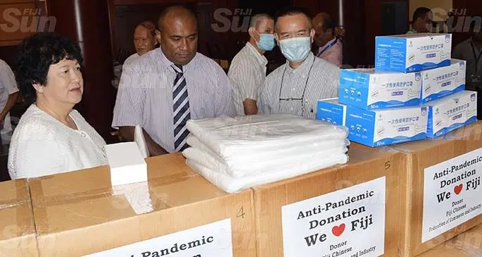 From left: Chinese Association of Fiji president, Jeeny Seeto, Minister for Health and Medical Services Dr Iferemi Waqainabete and Fiji Chinese Federation of Commerce and Industry president, William Seeto during the anti-pandemic donation on May 6, 2020. Photo: Ronald Kumar