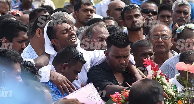Salvin Singh, helped by family members at the Votualevu Crematorium in Nadi on August 31, 2019. Photo: Waisea Nasokia
