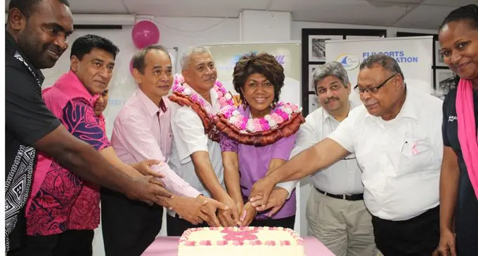 Fiji Ports Corporation Limited chief executive officer Vajira Pitasena (second from left), joins other shipping and marine companies in cutting their Pinktober cake at the Fiji Ports Corporation Limited in Walu Bay on October 25,2018. Fourth from left is Fiji Cancer Society board member, Makrawa Wilson and fifth from left is cancer survivor Laisa Vulakoro. Photo: Simione Haravanua