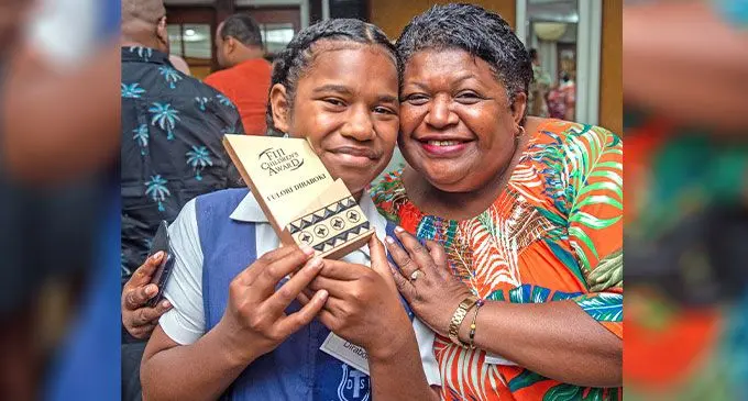 Year 8 student of Dravo District school Fulori Diraboki with her teacher Losana Nacola during the Fiji Children’s Awards in Suva on December 13, 2024. Photo: Leon lord