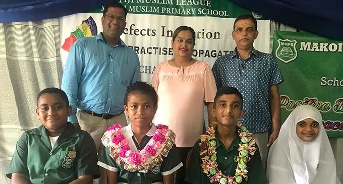 From left Headteacher Mohammed Jalim,Lachmi Prasad,Divisional Education Officer Pravin Nath.Stting from left Deputy Head boy Aisake Qioqele,Head Girl Adi Miliana Ratumaikoro,Head boy Pratik Narayan with Deputy Head girl Tasmiya Zakira after the prefect induction on February 14,2019.Photo:Mereleki Nai.