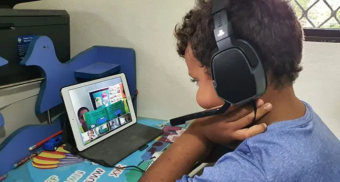 Samuela Tora using Zoom for daily lessons and classroom sessions from home during this COVID-19 pandemic.