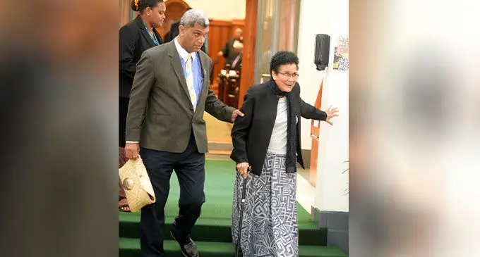 Opposition Members of Parliament Aseri Radrodro assist Mere Samisoni walking out of  Parliament on July 27, 2022. Photo: Ronald Kumar