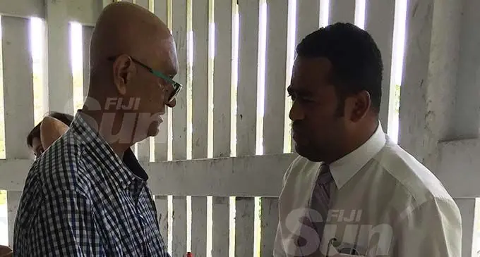 Shazran Abdul Lateef with his lawyer Filimoni Vosarogo outside the Magistrates Court in Suva on December 23, 2019. Photo: Ashna Kumar