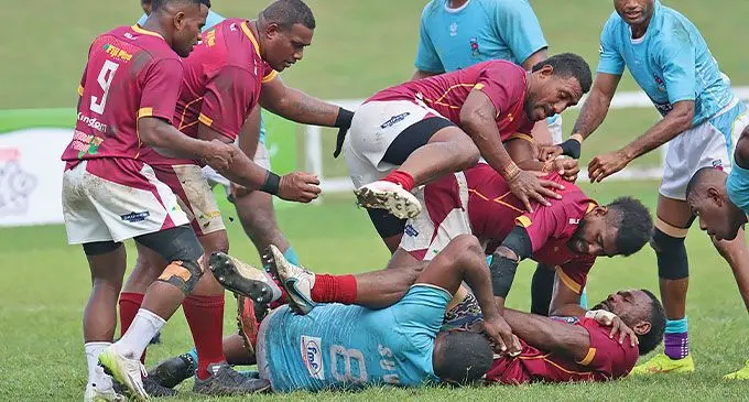 Fiji Pine Lautoka No.8 Apakuki Vuaviri keeps possession against FMF Suva at Lawaqa Park, Sigatoka, on May 18, 2024. Photo: Waisea Nasokia