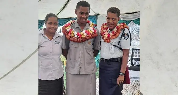 Levuka Police Station officer in charge, Inspector (W/IP) Alumita Rokobiau, with one of the head prefects. Photo: Fiji Police Force