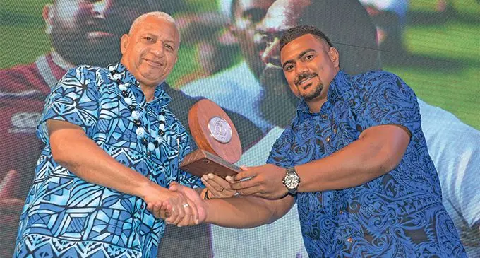 Flying Fijians forward Mesulame Dolokoto receiving the XVS Male player of the year winner award on behalf of Semi Radradra during the FRU Awards night at the GPH Suva on February 9,2019.Photo:Simione Haravanua.