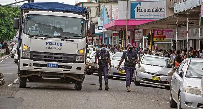 A Police truck was spotted in Suva City rounding up those who were not wearing their mask correctly or did not have a mask on. Photo: Leon Lord
