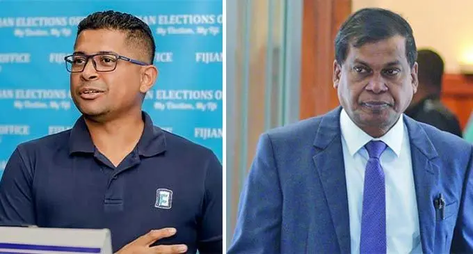 Supervisor of Elections, Mohammed Saneem and National Federation Party leader, Biman Prasad.