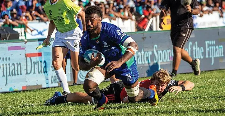 Swire Shipping Fijian Drua flanker Joseva Tamani on his way to score a try against the Crusaders, on March 11, 2023. The Drua won 25-24. Photo: Leon Lord