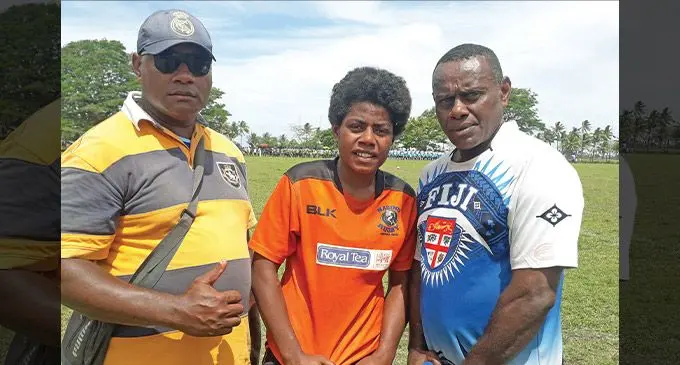Elena Tabuanise (middle) with her dad Watisoni Kaitaci(right) at the Suva Grammar School grounds on September 10,2022. Photo: Sereana Salalo