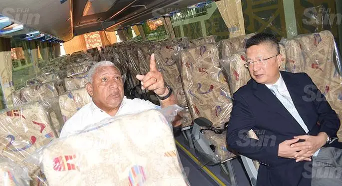 Prime Minister Voreqe Bainimarama (left) and Chinese Ambassador to Fiji Qian Bo following the handing over of two bus Fiji Rugby Union on May 21, 2020. Photo: Ronald Kumar.