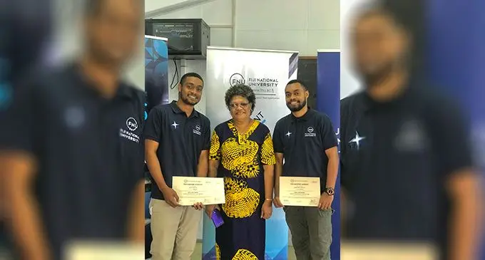 Tevita Tawatatau (Right) and Sekope Tawatatau (left) with their mother Luisa Tawatatau (centre) at the Fiji Maritime Academy after the Deckhand Fishing programme graduation on August, 12, 2022. Photo: Jone Salusalu