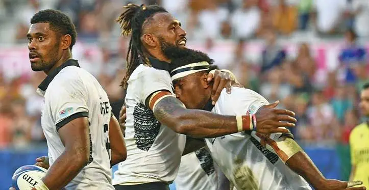 Flying Fijians full back Ioane Droasese (from left) and captain Waisea Nayacalevu celebrate Vinaya Habosi's try against Georgia during their Pool C match at the Rugby World Cup on October 2, 2023. Fiji won 17-12. Photo: World Rugby