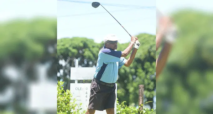 Senior golfer Ravindra Lal makes a swing at the Fiji Goilf Club in Suva on October 28, 2022. Photo: Leon Lord