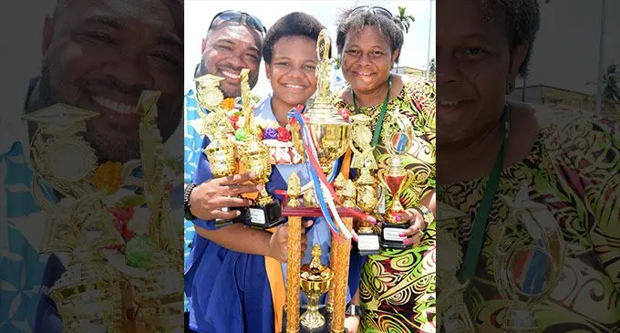Suva Primary School dux Isabella Vakacolasa with proud parents Paula and Torika Vatoga on December 7, 2022. Photo: Ronald Kumar