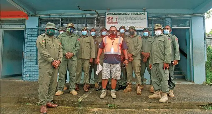 Minister for Rural, Maritime Development and Disaster Management and Minister for Defence, National Security and Policing Inia Seruiratu with the Republic of Fiji Military Forces personnel who were assisting in the cyclone rehabilitation works at Wainibuka on January 10, 2022. Photo: Leon Lord